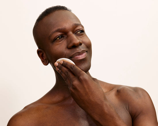 Man cleansing face with 5 in 1 skincare